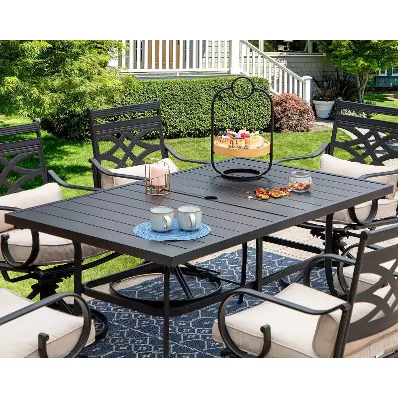 Ensemble de salle à manger d'extérieur 7 pièces avec chaises pivotantes et coussins et table en acier avec trou pour parasol - Captiva Designs