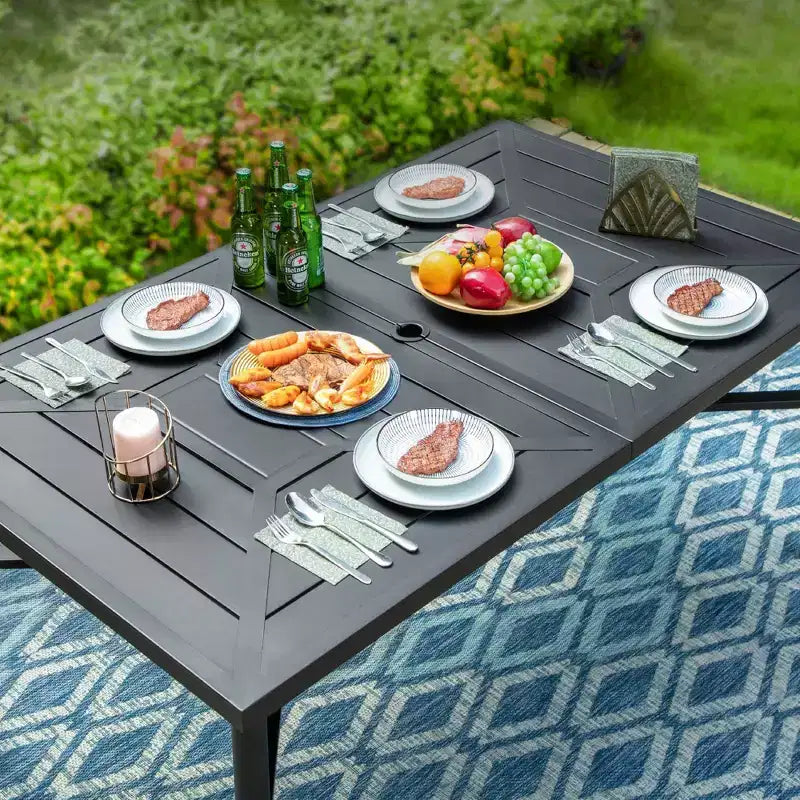 Ensemble de salle à manger d'extérieur 7 pièces : Table en acier, chaises en osier, coussins - Captiva Designs