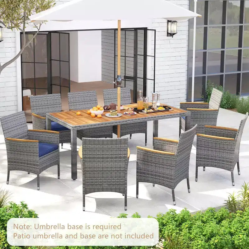 Costway Ensemble de salle à manger d'extérieur 9 pièces pour 8 personnes avec table et chaises en rotin PE et 2 trous pour parasol Bleu marine/Blanc