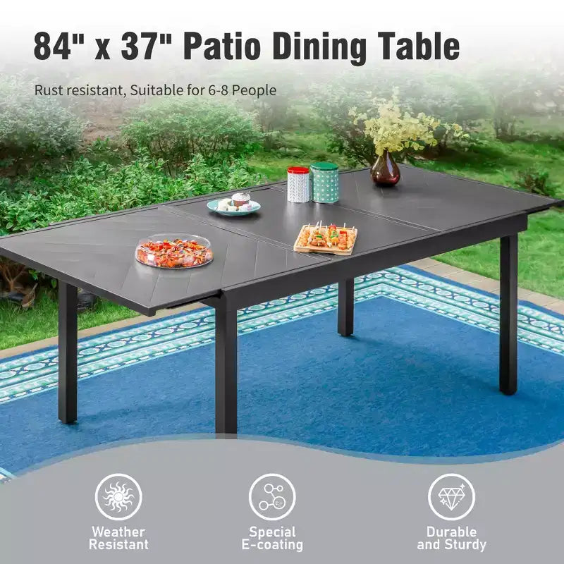 Captiva Designs Ensemble repas de 9 pièces pour terrasse avec table extensible rectangulaire en acier, chaises fixes en rotin et métal et fauteuils pivotants.