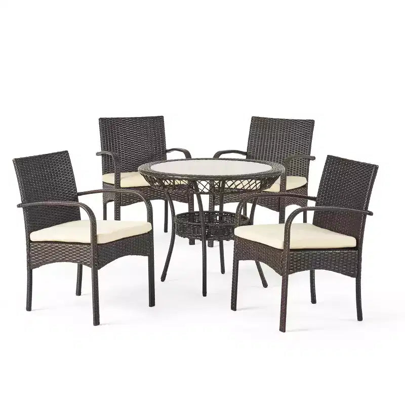 Ensemble de salle à manger GDFStudio Kija d'extérieur 5 pièces en osier et verre trempé avec coussins