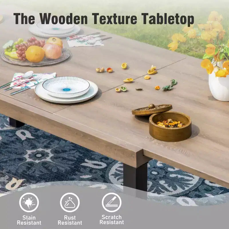 Captiva Designs - Table à manger extensible en acier 7 pièces et chaises en rotin avec accoudoirs en croissant pour l'extérieur