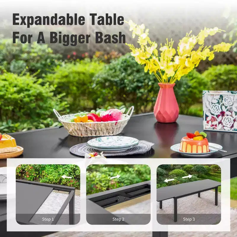 Captiva Designs - Table à manger extensible en acier 7 pièces et chaises en rotin avec accoudoirs en croissant pour l'extérieur