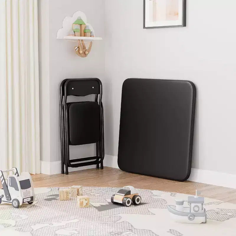 Ensemble table et deux chaises pliantes pour enfants, avec coussins en PU, facile à ranger, idéal pour les repas, la lecture et les jeux des enfants.