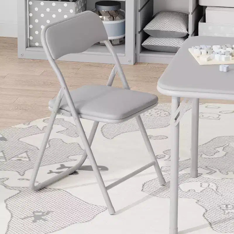 Ensemble table et deux chaises pliantes pour enfants, avec coussins en PU, facile à ranger, idéal pour les repas, la lecture et les jeux des enfants.