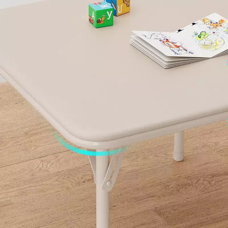 Ensemble table et deux chaises pliantes pour enfants, avec coussins en PU, facile à ranger, idéal pour les repas, la lecture et les jeux des enfants.