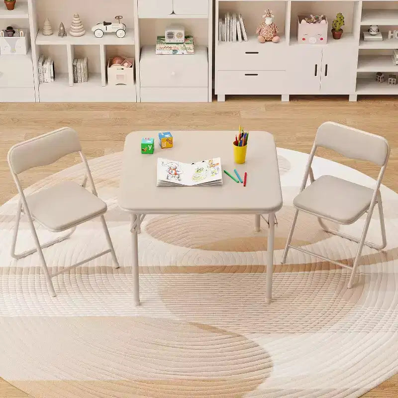 Ensemble table et deux chaises pliantes pour enfants, avec coussins en PU, facile à ranger, idéal pour les repas, la lecture et les jeux des enfants.