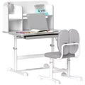 Qaba Kids Desk and Chair Set, Height Adjustable Kids School Study Desk and Chair Set with Tilt Desktop, Storage Drawer and Reading Rack, Gray