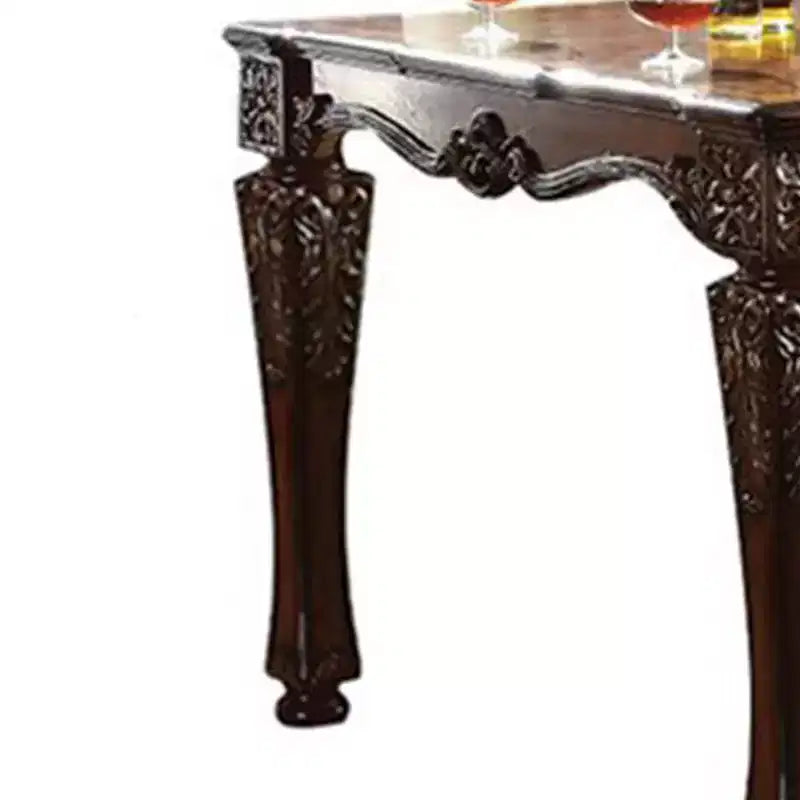 54-inch cherry wood veneer side table with turned wood legs and floral pattern