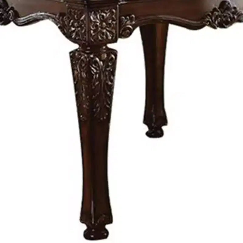 54-inch cherry wood veneer side table with turned wood legs and floral pattern