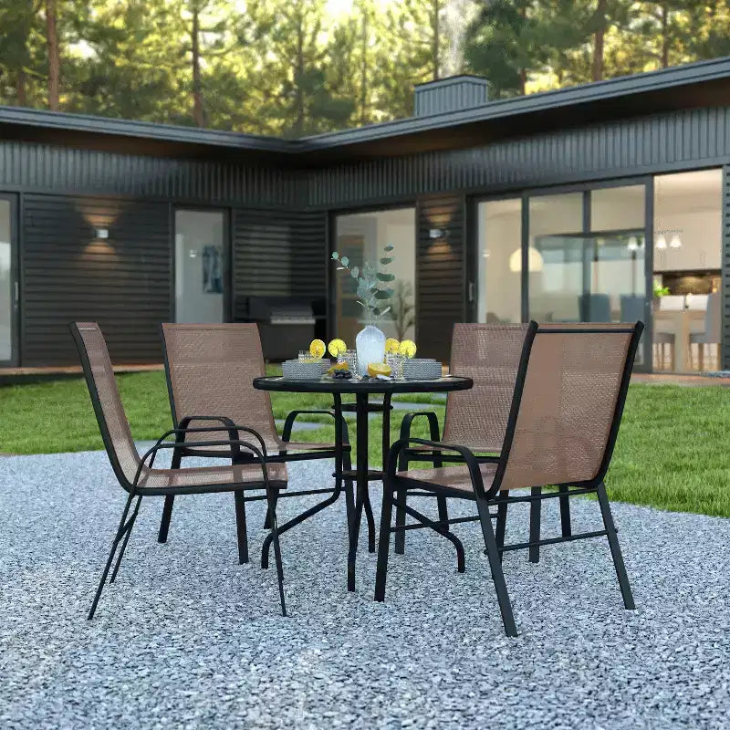 Emma et Oliver Ensemble de salle à manger de jardin cinq pièces avec table ronde en métal avec plateau en verre trempé et 4 chaises empilables Flex Comfort